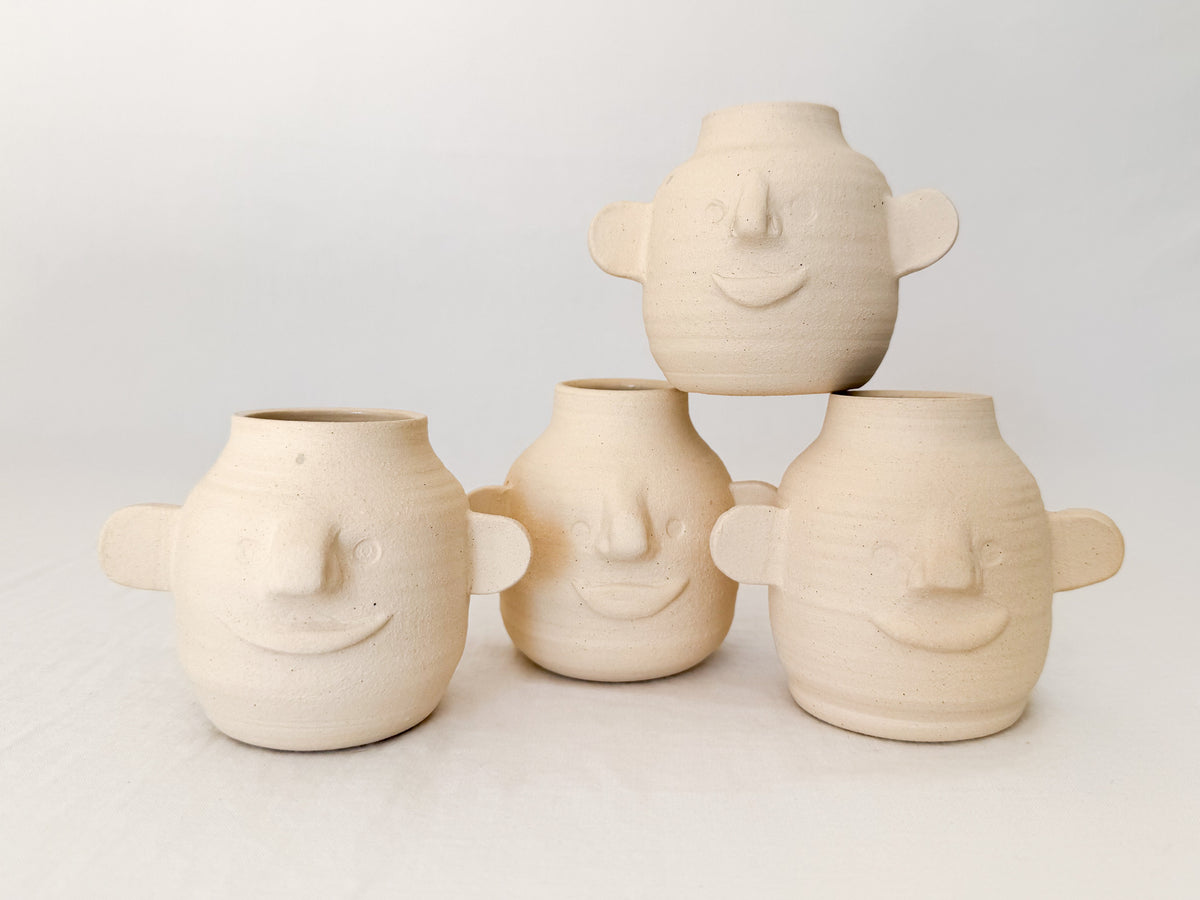 Tiny Face Vase